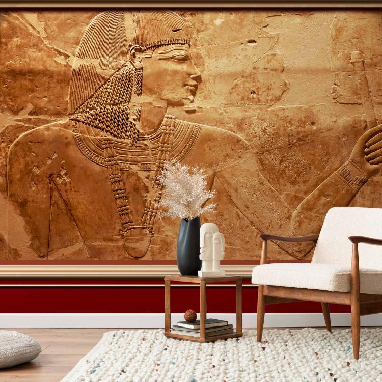 Wall Mural Ancient Egypt - sculpture of a pharaoh on a sand background with two columns
