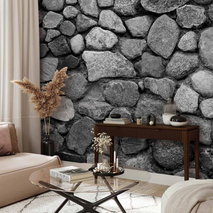 Wall Mural Grey defence - textured background of irregular stones in grey