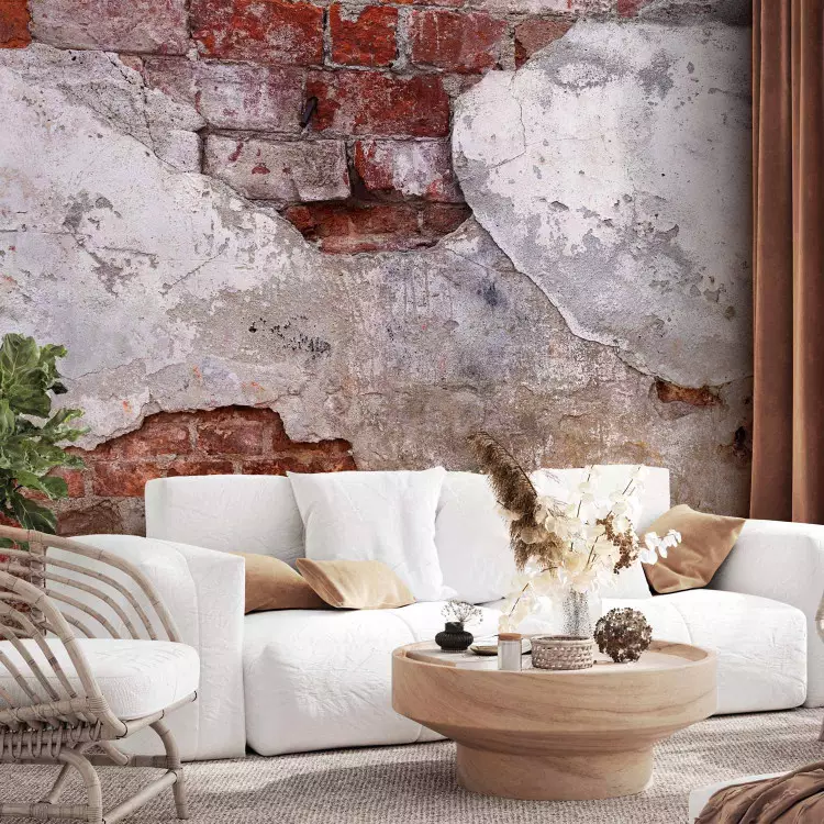 Wall Mural Loft rawness - Imitation of a red brick wall covered with plaster, ideal composition for industrial interiors