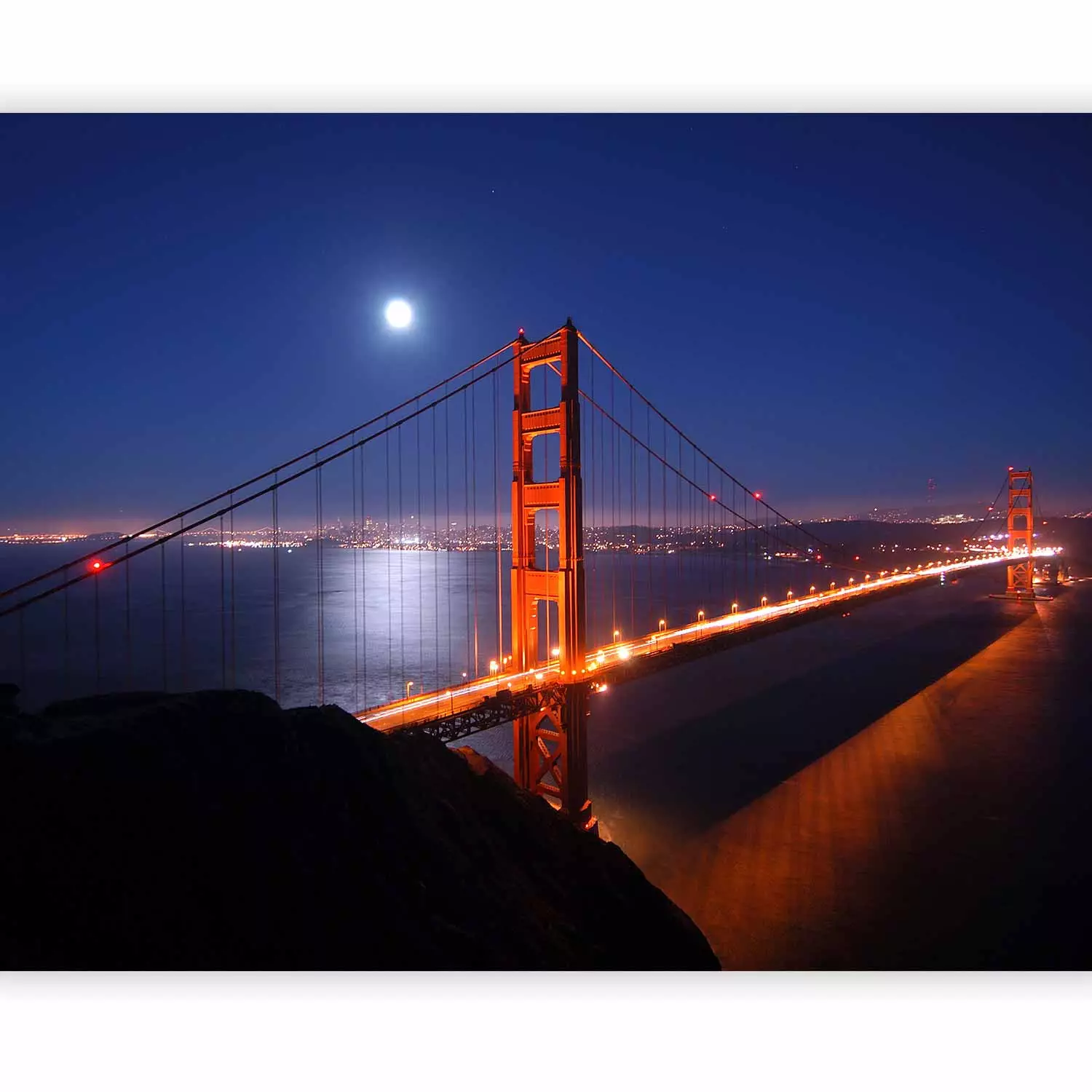 Urban architecture of San Francisco - Golden Gate Bridge with moon at night