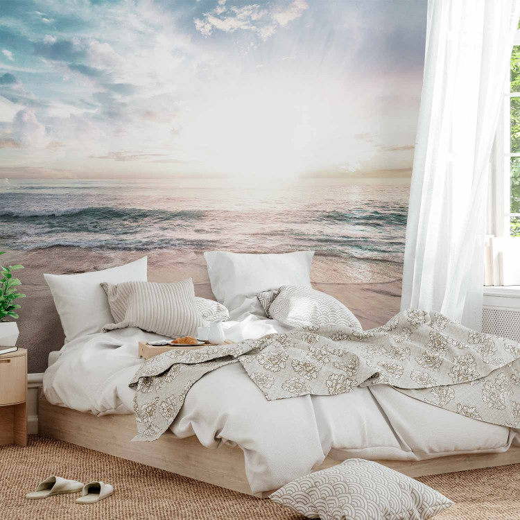 Wall Mural Beach in the morning - landscape with a peaceful sea, clouds and sun 138810 additionalImage 2