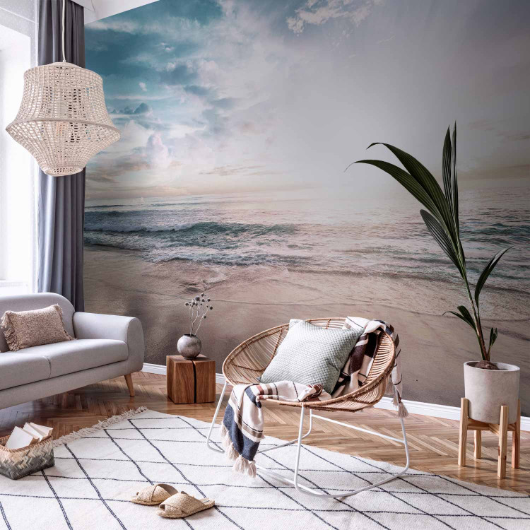 Wall Mural Beach in the morning - landscape with a peaceful sea, clouds and sun 138810