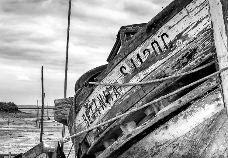 Poster Journey into Nature - black and white abandoned boat against sky and clouds 138720 additionalImage 10