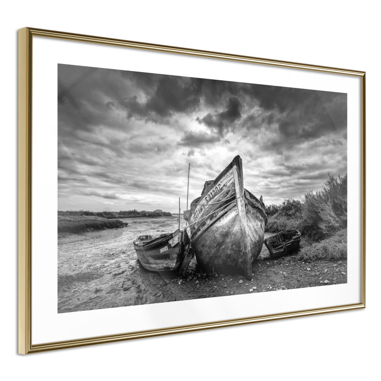 Poster Journey into Nature - black and white abandoned boat against sky and clouds 138720 additionalImage 2