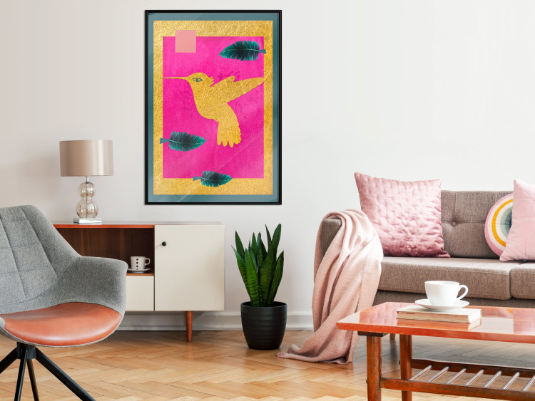 Wall Poster Golden Hummingbird - abstraction with a bird and green leaves on a pink background 116930 additionalImage 3