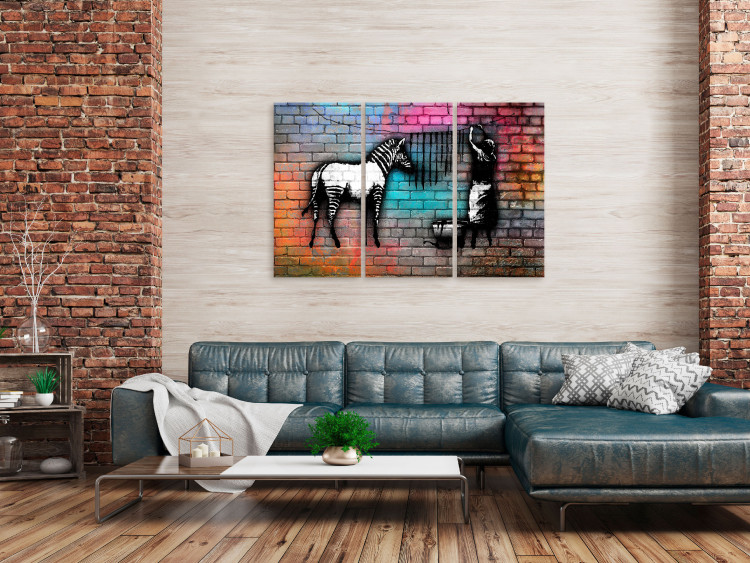 Canvas Zebra washing - street art graphics on an abstract, colorful brick 118540 additionalImage 3