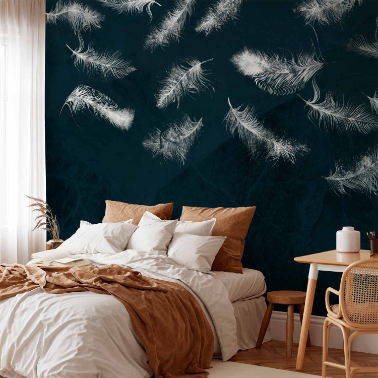 Photo Wallpaper In flight - white feathers carried by the wind on a dark blue background with pattern 142640 additionalImage 2
