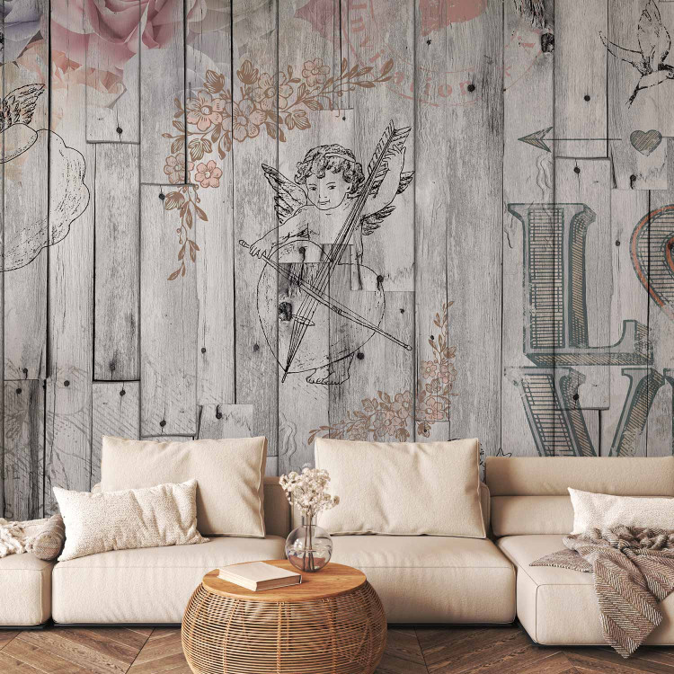 Wall Mural Postcard - composition with angels and flowers on a grey wooden background 64250