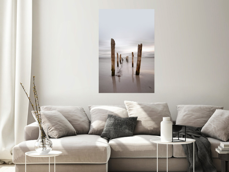 Wall Poster Illusory Calm - seascape with wooden posts against the sky 130270 additionalImage 2