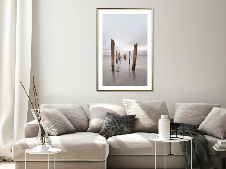Wall Poster Illusory Calm - seascape with wooden posts against the sky 130270 additionalImage 13