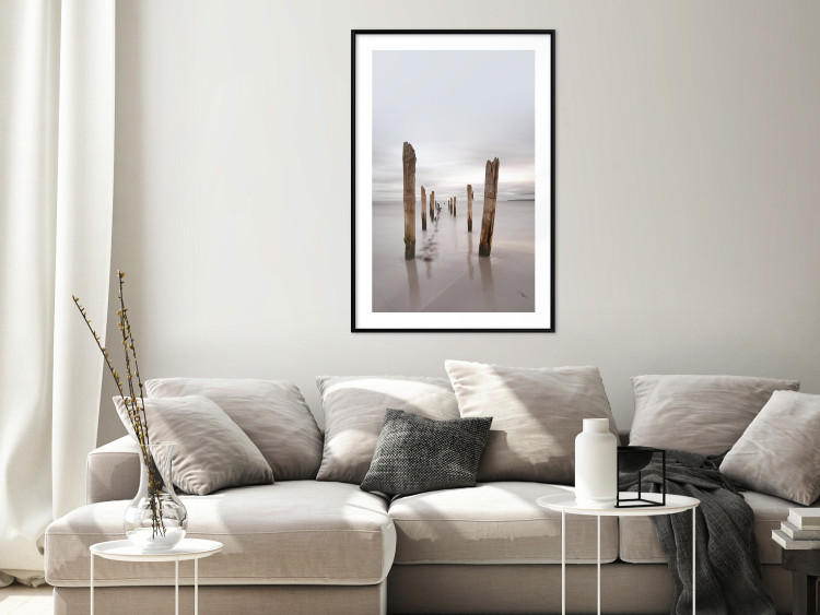 Wall Poster Illusory Calm - seascape with wooden posts against the sky 130270 additionalImage 18