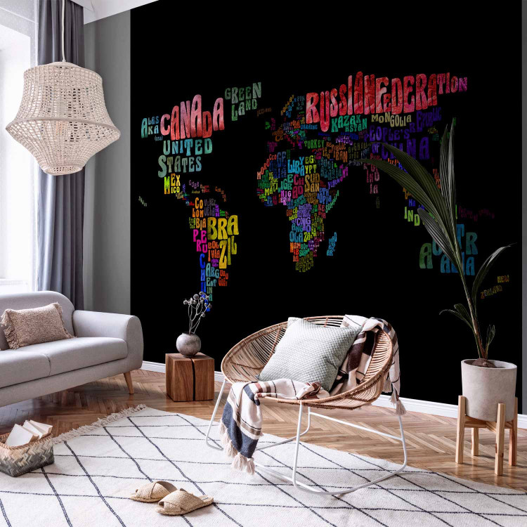 Wall Mural Colourful Journeys - World Map with Colourful Text on a Black Background 59990