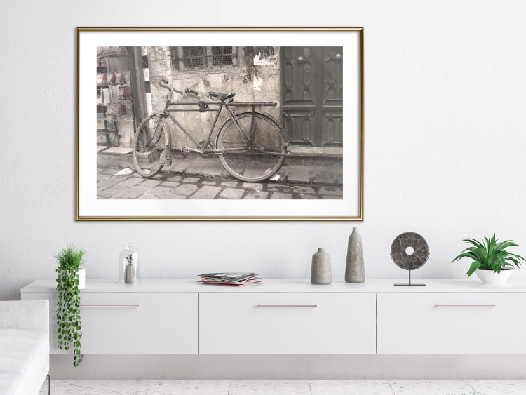 Wall Poster Two-Wheeler - urban scene of a stone street with a vintage-style bicycle 116701 additionalImage 13