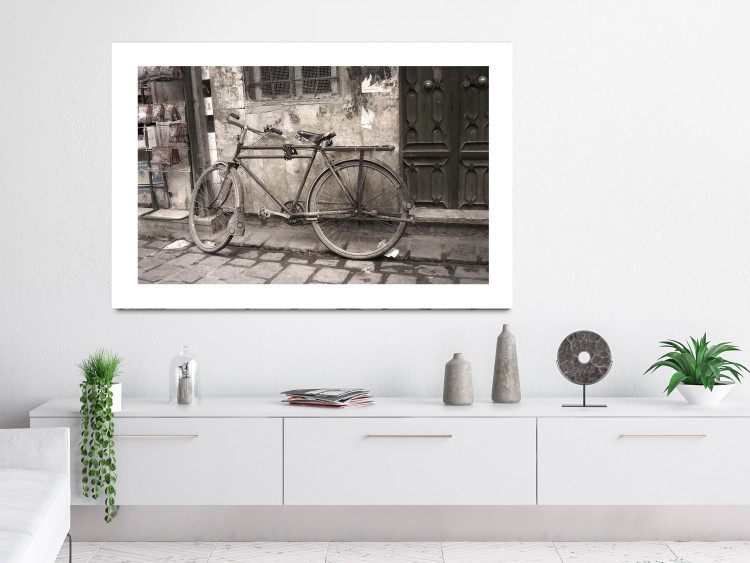 Wall Poster Two-Wheeler - urban scene of a stone street with a vintage-style bicycle 116701 additionalImage 2