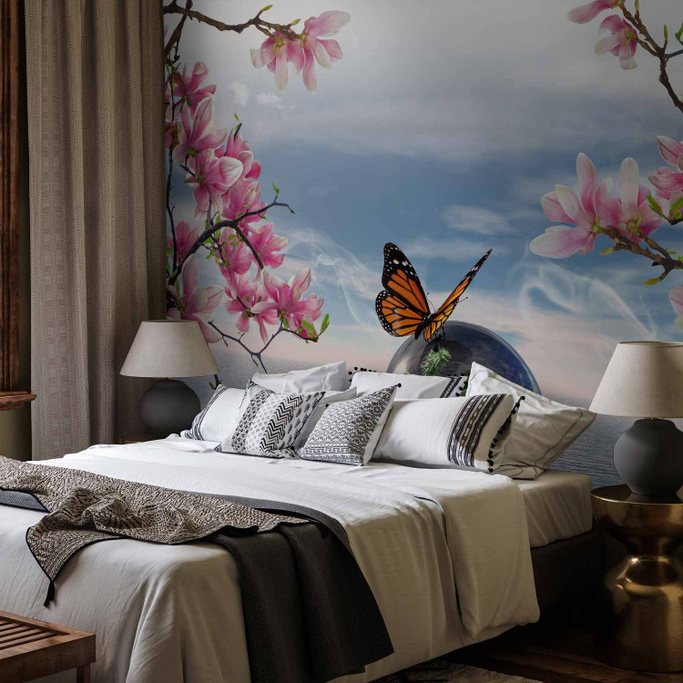 Wall Mural Butterfly Fantasy - Butterfly on a ball against the sea and magnolia background 61301 additionalImage 2