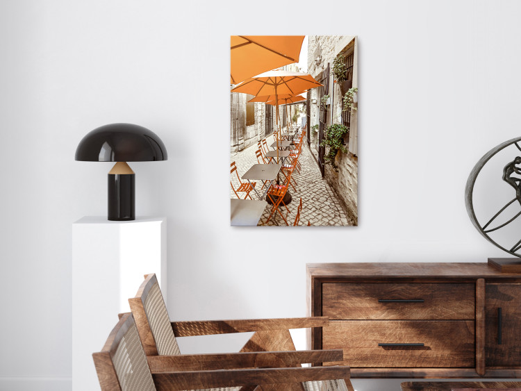 Canvas Italian Cafe - a photo of a narrow streets with tables and umbrellas 135841 additionalImage 3