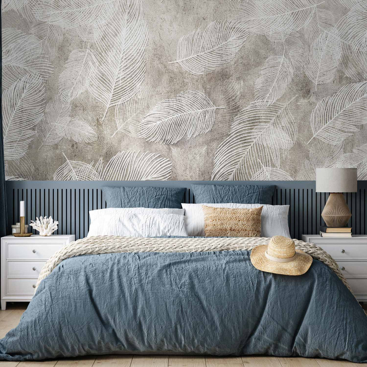 Wall Mural White Feathers - Bright Composition on a Raw Concrete Background 148541 additionalImage 2