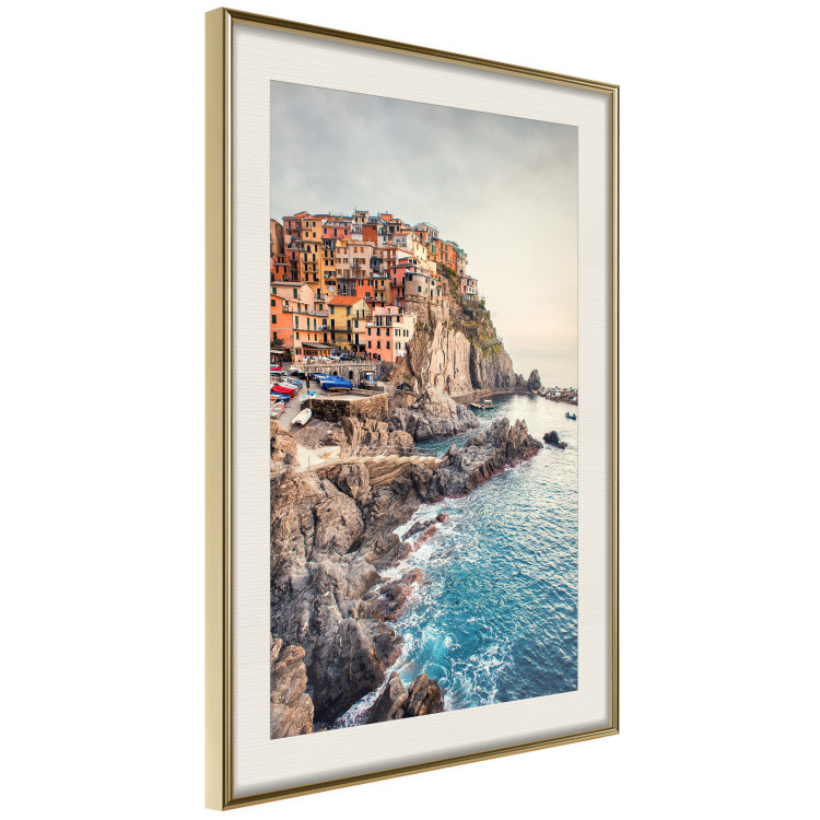 Wall Poster Magical Harbor - landscape of architecture on cliffs against the ocean 130451 additionalImage 3