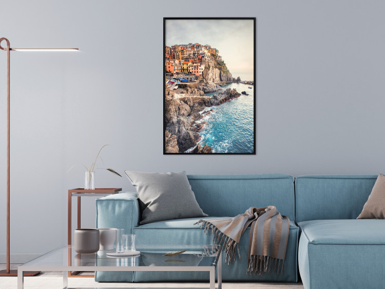 Wall Poster Magical Harbor - landscape of architecture on cliffs against the ocean 130451 additionalImage 6