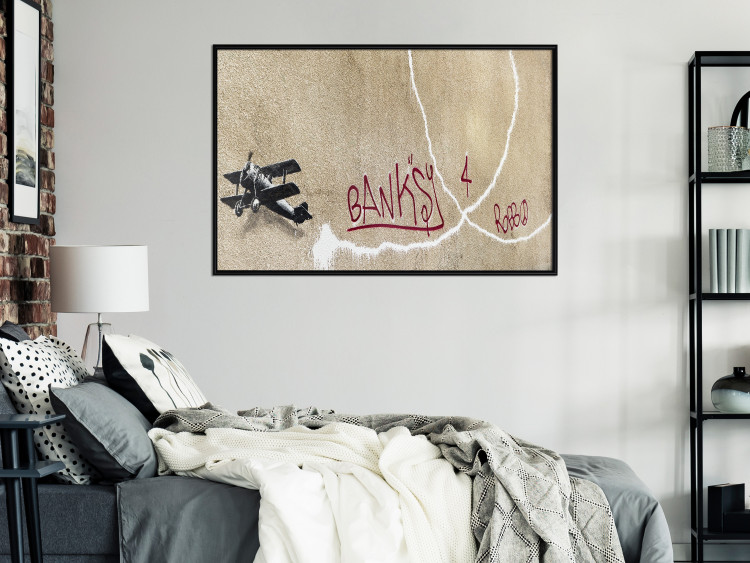 Wall Poster Biplane - mural of an airplane and red graffiti on a light wall 132451 additionalImage 5