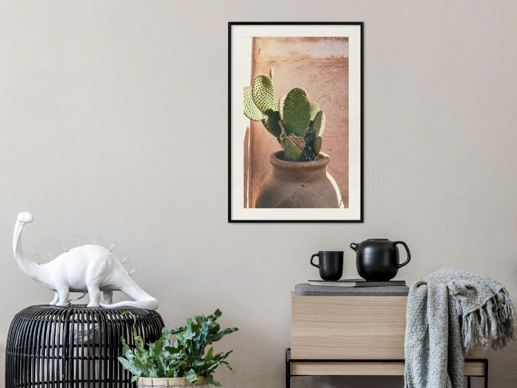 Wall Poster Cactus in a Pot - succulent in a pot against the bright sunlight 134751 additionalImage 24