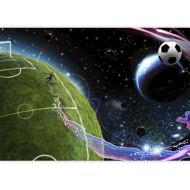 Wall Mural Cosmic Match - Soccer player playing on the field kicking the ball into space 61151 additionalImage 3