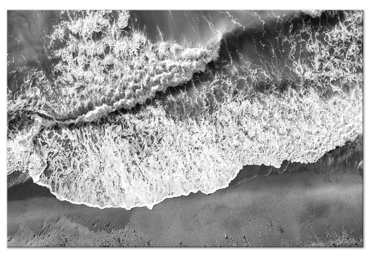 Canvas Print Ocean shore - black and white photograph of waves hitting the beach 115161
