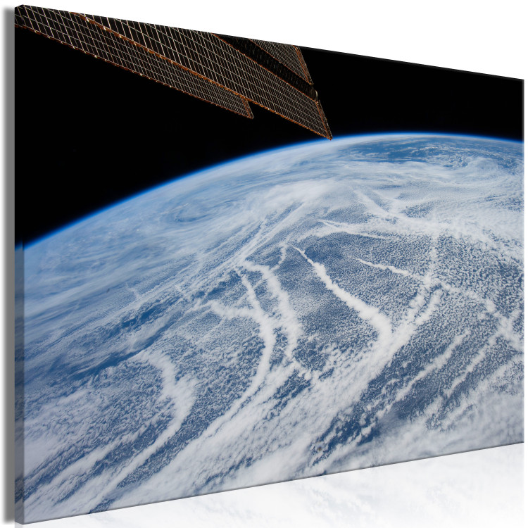 Canvas Art Print Space flight - a satellite photo of the Earth and the cloud band 123161 additionalImage 2