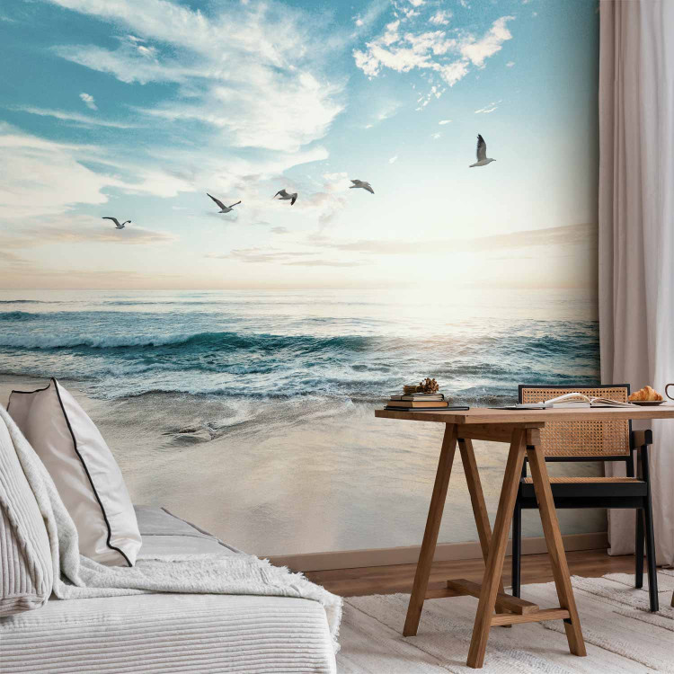 Wall Mural Abandoned beach - seascape with waves, birds and a setting sun 138461 additionalImage 4