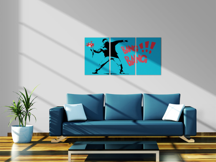 Canvas Art Print The best weapon - graffiti a la Banksy with a masked man 55471 additionalImage 3