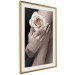Wall Poster Subtle Fragrance - woman's hand holding rose flower on black background 128081 additionalThumb 3