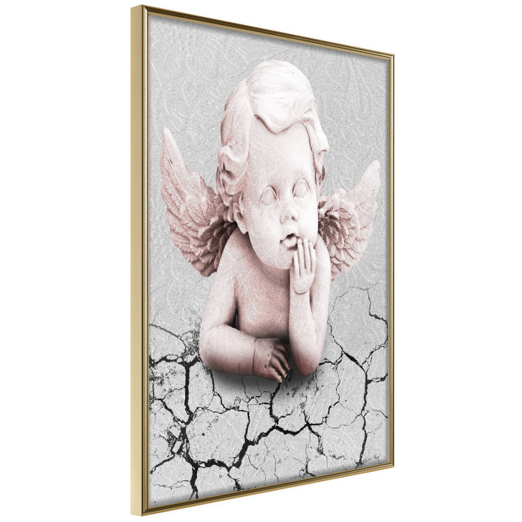Poster Angel - light pink figurine of a boy leaning on gray cracked earth 116791 additionalImage 12
