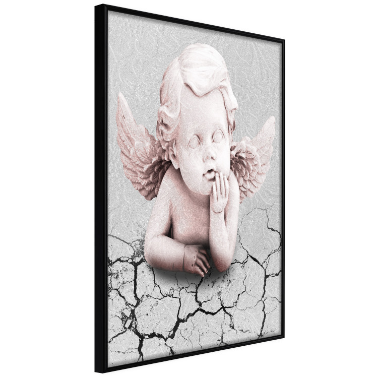 Poster Angel - light pink figurine of a boy leaning on gray cracked earth 116791 additionalImage 10
