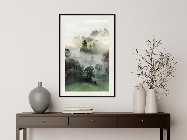 Wall Poster Morning Chill - landscape of trees surrounded by dense fog against the sky 130291 additionalImage 18