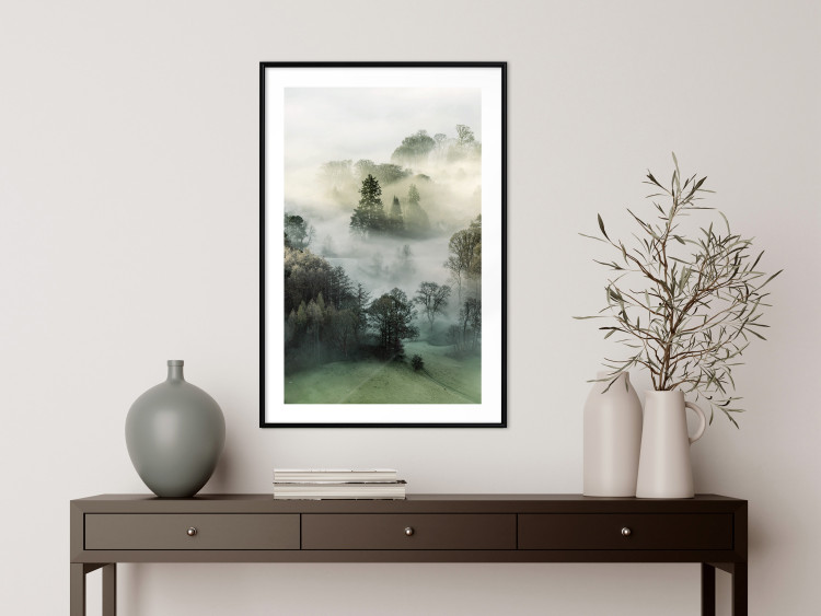 Wall Poster Morning Chill - landscape of trees surrounded by dense fog against the sky 130291 additionalImage 21
