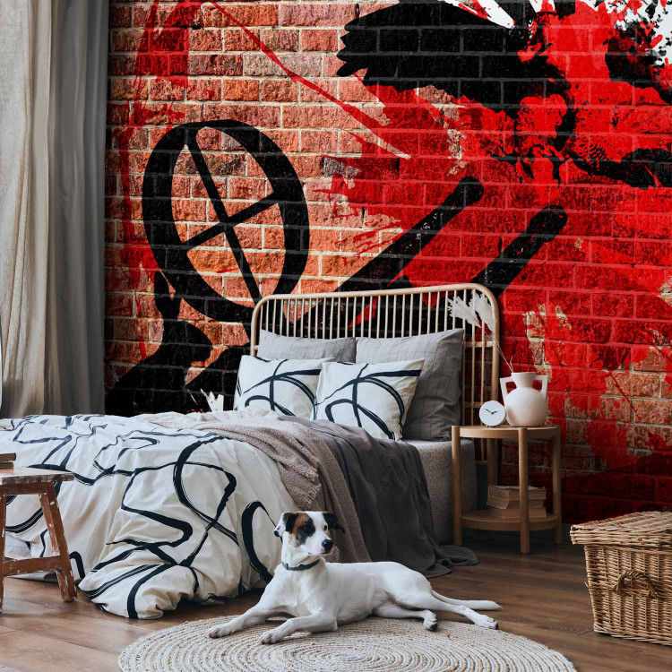Photo Wallpaper Hunted - Street Art Mural on a Red Brick Surface 60512 additionalImage 2