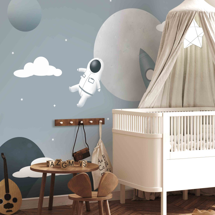 Wall Mural Astronaut in Space - Rocket and Planets in the Gray-Blue Sky 148442 additionalImage 4