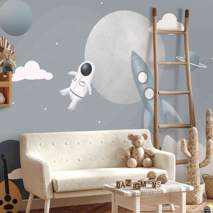 Wall Mural Astronaut in Space - Rocket and Planets in the Gray-Blue Sky 148442 additionalImage 6