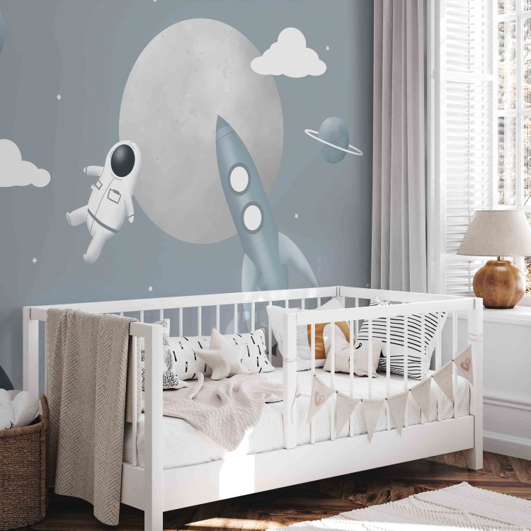 Wall Mural Astronaut in Space - Rocket and Planets in the Gray-Blue Sky 148442 additionalImage 5