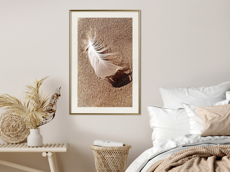 Poster Feather on the Sand - seascape of a beach with a white feather in bright light 130372 additionalImage 22