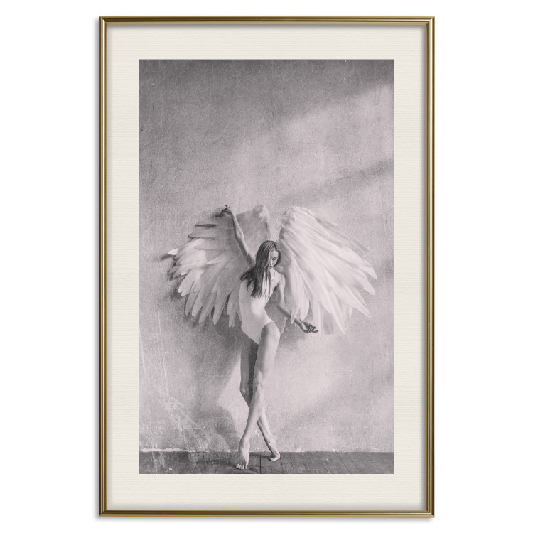 Poster Winged - black and white woman with large wings against a concrete background 134182 additionalImage 20