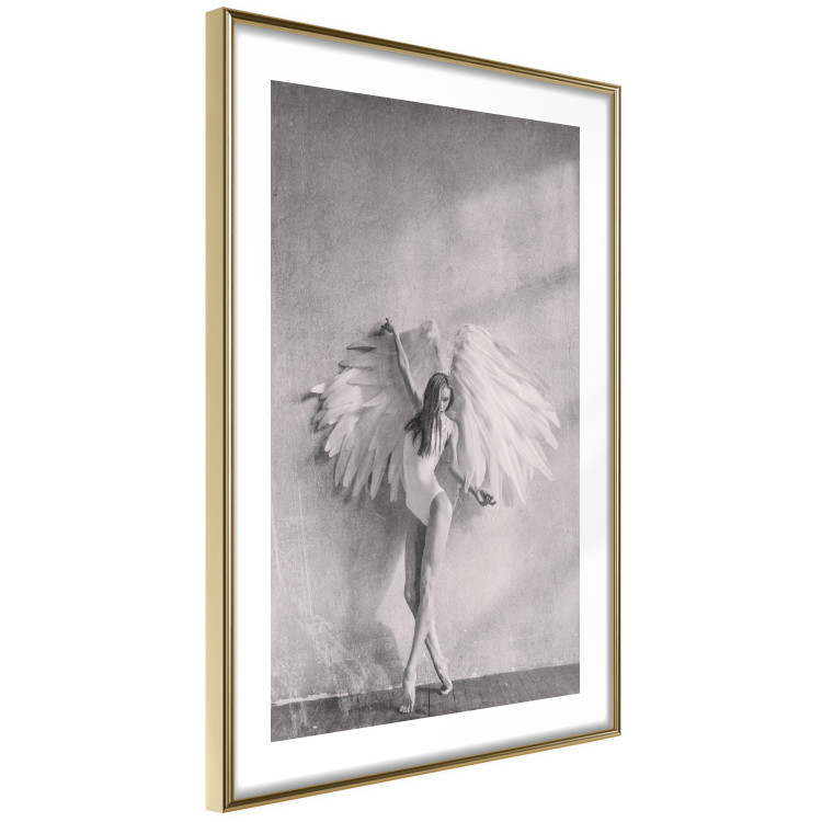 Poster Winged - black and white woman with large wings against a concrete background 134182 additionalImage 9