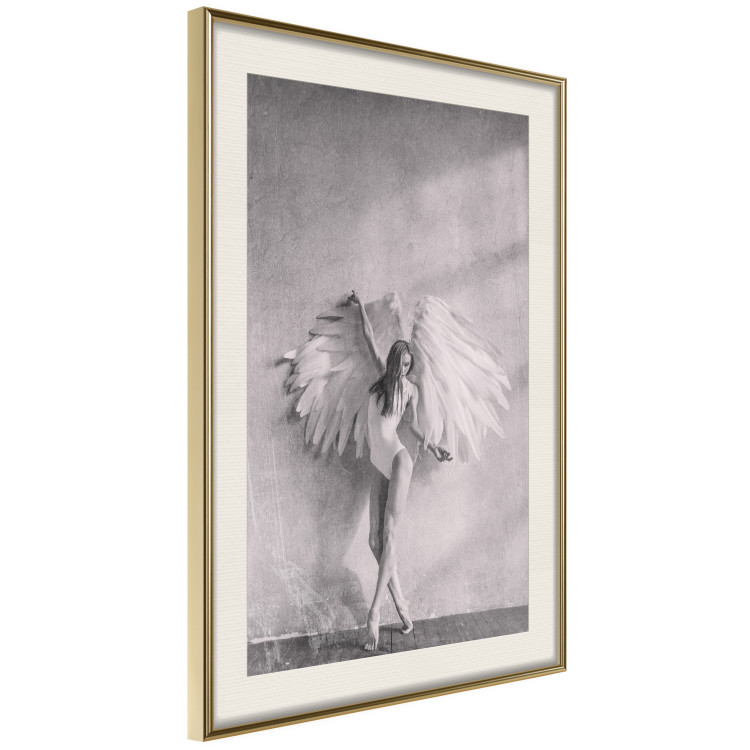 Poster Winged - black and white woman with large wings against a concrete background 134182 additionalImage 2