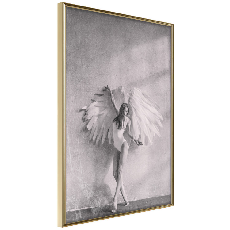 Poster Winged - black and white woman with large wings against a concrete background 134182 additionalImage 14