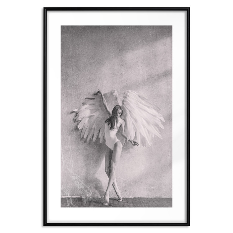 Poster Winged - black and white woman with large wings against a concrete background 134182 additionalImage 18