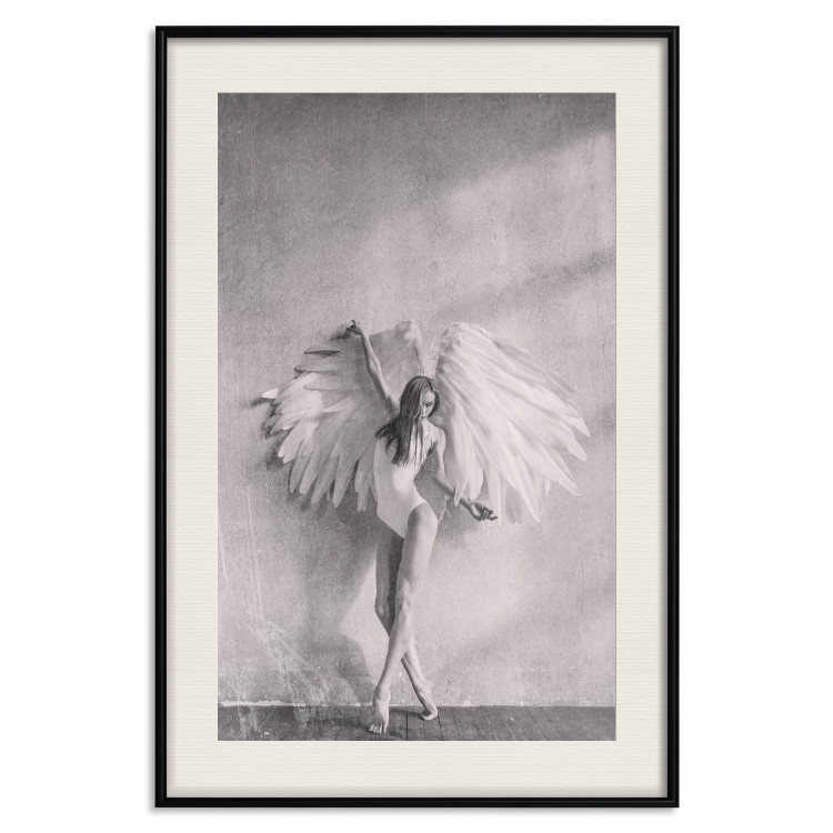 Poster Winged - black and white woman with large wings against a concrete background 134182 additionalImage 19