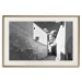 Poster Narrow alley - black and white urban street scene against architectural backdrop 115003 additionalThumb 19