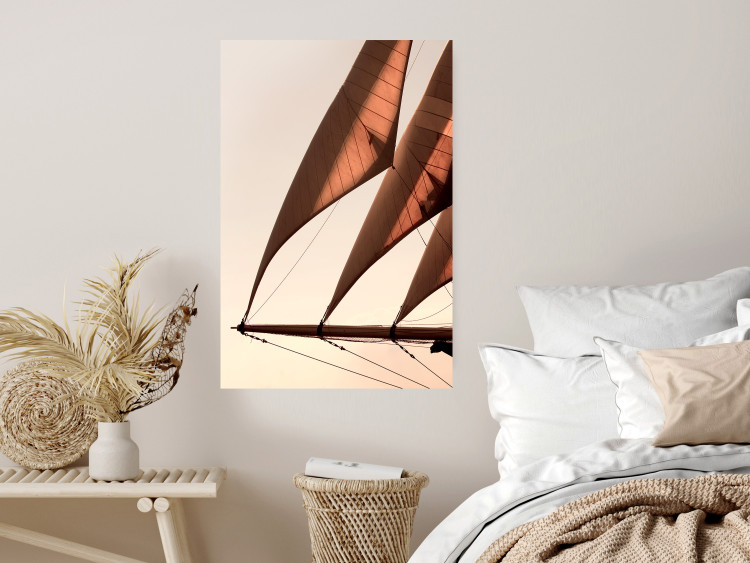 Poster Sea Breeze - seascape of the front of a sailboat in sepia tones against the sky 129723 additionalImage 2