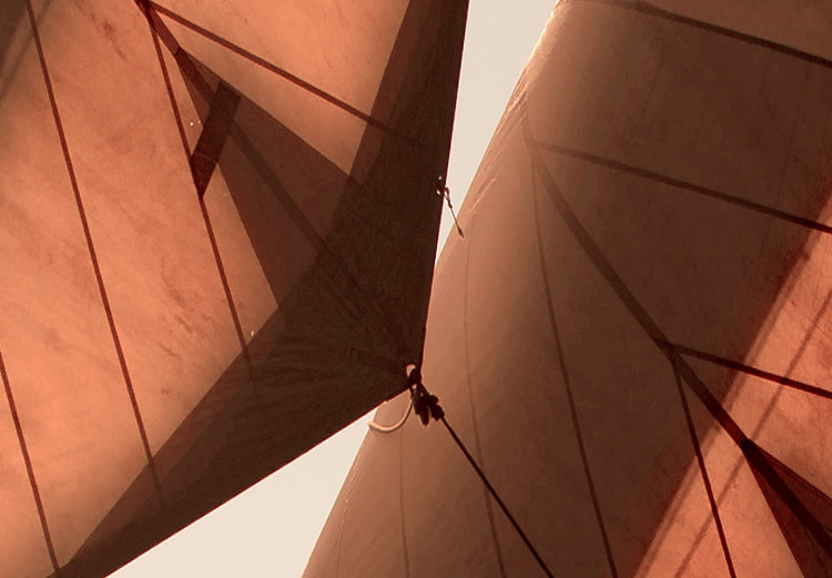 Poster Sea Breeze - seascape of the front of a sailboat in sepia tones against the sky 129723 additionalImage 10