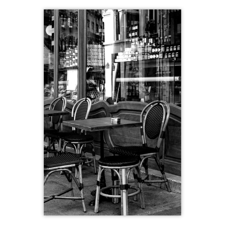 Wall Poster Parisian Café - gray landscape of chairs and a table against the backdrop of a café 132273